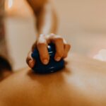 Close-up of cupping therapy on a person's back, focusing on relaxation and wellness.